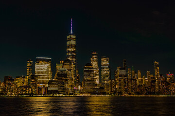Manhattan with NY night city skyline. Cityscape of NYC Manhattan. Skyscraper cityscape of...