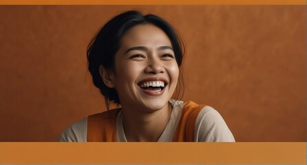 young filipino middle aged woman on plain bright orange background laughing hysterically looking at camera background banner template ad marketing concept from Generative AI - obrazy, fototapety, plakaty