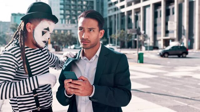 Businessman, smartphone and mime in city with character for street performance, entertainment or comedy. Asian person, actor and thinking with tech for email, networking and comic in New York