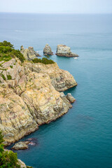 Beautiful aerial view of cliff and blue ocean, Oedo-Botania island, Geoje, South Korea.