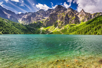 Beautiful lake in the Tatra Mountains at sunrise - obrazy, fototapety, plakaty