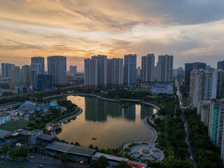 Fototapeta premium Aerial skyline view of Hanoi cityscape at sunset in Le Van Luong street