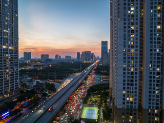 Fototapeta na wymiar Aerial skyline view of Hanoi cityscape at sunset in Pham Hung street