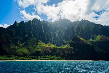 Beautiful scenery of rocky cliffs on Napali Coast, Kauai, Hawaii on a sunny day