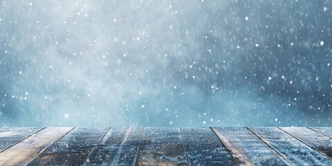 Wooden planks with a backdrop of gently falling snow, conveying a serene and wintry atmosphere. - obrazy, fototapety, plakaty