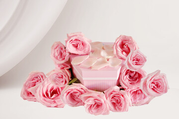 Product podium placement with pink roses flowers on white background, Empty podium with rose and...