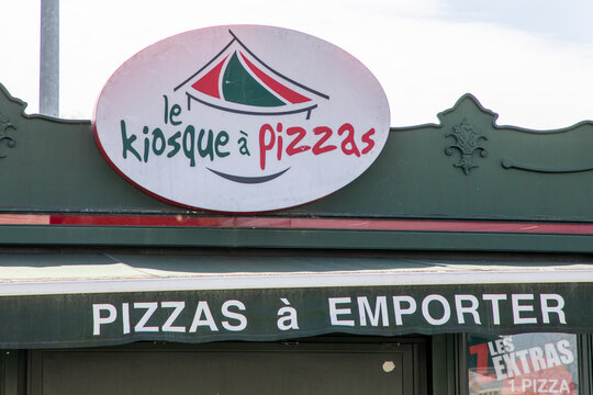 le kiosque a pizza logo brand and text sign front of takeaway pizza kiosk and homemade pizzas