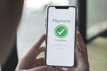 Payment complete Notifications. Customer using online banking application on smartphone to pay for purchases online and product in department store - obrazy, fototapety, plakaty