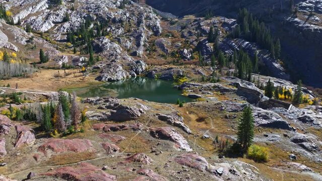Aerial Flying towards Lake Lillian in Big Cottonwood Canyon Utah with beautiful Rocky Mountains landscape