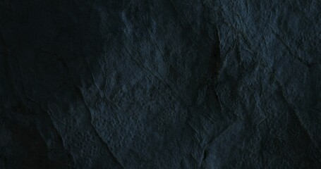 Rugged Texture of Stone Surface in dim light. Close-up, shallow dof.
