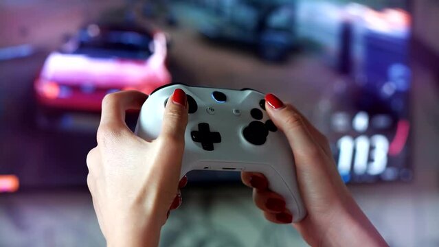 Gamer virtual playing on joystick video console	