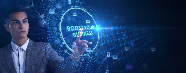 Business, Technology, Internet and network concept. Young businessman shows the word: Boost your business.