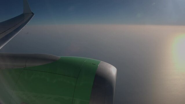 Ottawa Ontario Canada - Feb 6th 2023 - Flair discount airline - wing and engine painted green in sky