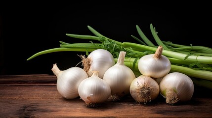 Brown onions and slices on wooden cutting board.Healthy food background.