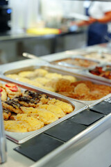 Variety of Food Displayed on Buffet Table