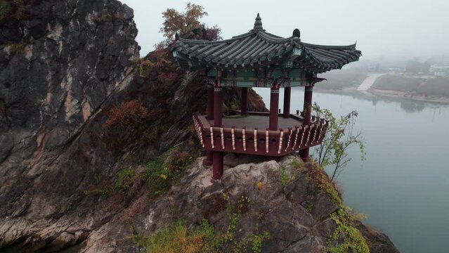 Dodamsambong Peaks Danyang Korea Drone Footage of peaks in river with pagoda and f og