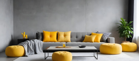 A living room featuring a gray couch adorned with bright yellow pillows, creating a modern and inviting atmosphere