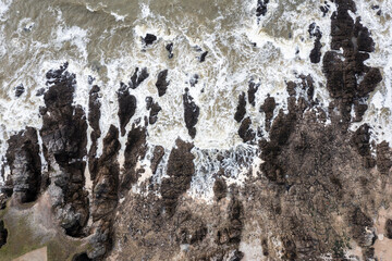 Rocky ocean coast in France, view from a drone.