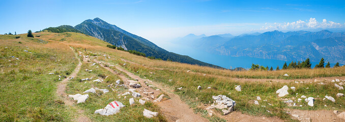 panoramic landscape Monte Baldo, hiking trail at the mountain ridge