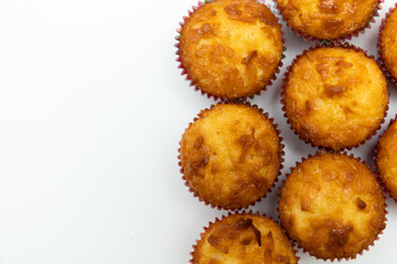 Tasty coconut macaroons on a white background.