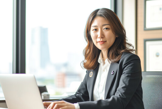 Portrait of a beautiful Asian business woman in the office