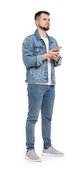 Man in denim clothes using mobile phone on white background