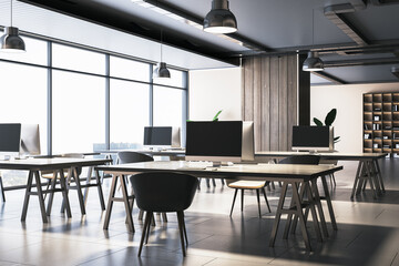 Wooden and concrete coworking office interior with panoramic window and city view. Workplace...