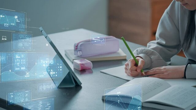 Girl studying while looking at a tablet and digital technology. e-learning concept.