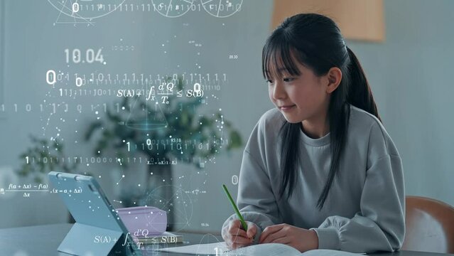 タブレットを見ながら勉強する女の子とデジタルテクノロジー　eラーニング