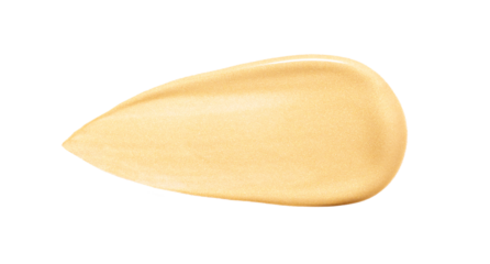 creamy cosmetic texture of golden shining color cosmetic smear on transparent background