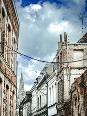 Street view of old village Valenciennes in France - 780347515