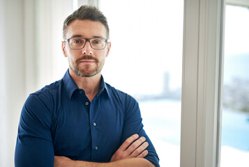 Portrait, home and man with arms crossed, confidence and realtor with property management. Face,...