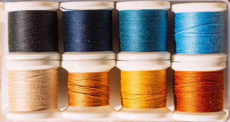 Close-up of colorful skeins of sewing thread.