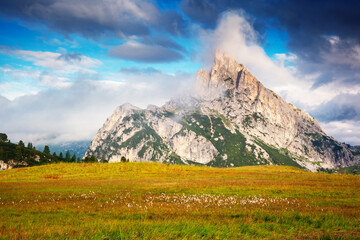 Misty view of the Mt. Sass de Stria from Falzarego pass. Dolomites, South Tyrol, Italy, Europe. - 780357718