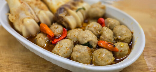 Delicious Indonesian meatballs with huge bones contains bone marrow in spicy beef broth and chilies