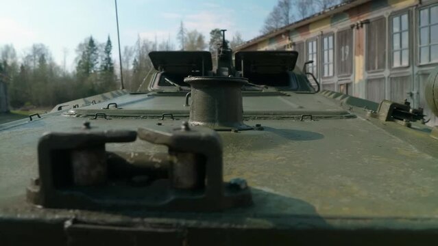 A robust, green, mid-20th century Soviet armored reconnaissance and patrol vehicle, designed for military reconnaissance, also classified as an armored vehicle by NATO.