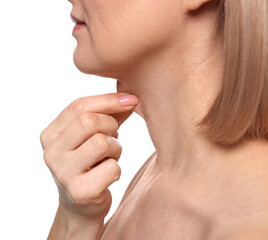 Woman touching her neck on white background, closeup