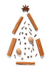 Christmas tree made of different spices on white background, top view