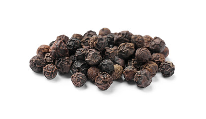 Aromatic spice. Many black dry peppercorns isolated on white