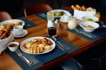 Food and drinks served for breakfast in a restaurant at  hotel.