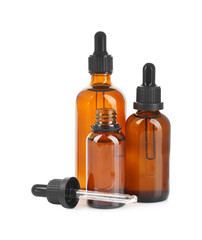 Glass bottles and pipette with tincture isolated on white