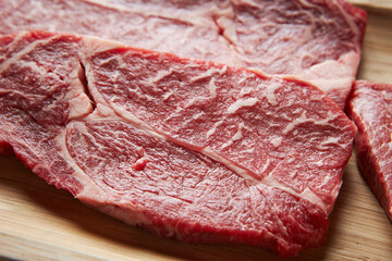 raw meat on a cutting board