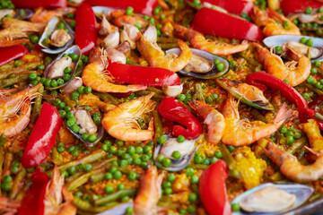 A dish of rice, meat, seafood, etc. stir-fried together in a frying pan