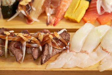 Different types of sushi on a plate