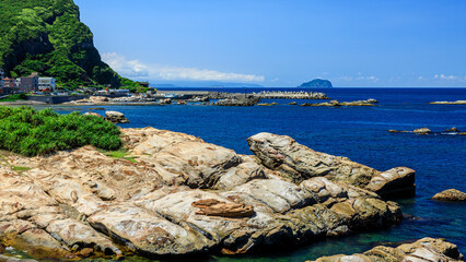 Peculiar rocks in forms of a seal and a Flip Flop at Nanya of Rueifang District in New Taipei City,...