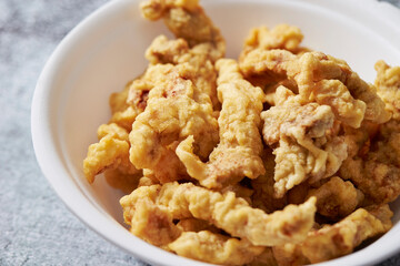 Fried meat in a bowl, sweet and sour pork