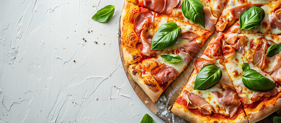 Sliced delicious prosciutto pizza with tomato sauce, cheese, ham and basil top view. Italian food, dish, meal, snack, dinner, lunch.	White background.
- 780394355