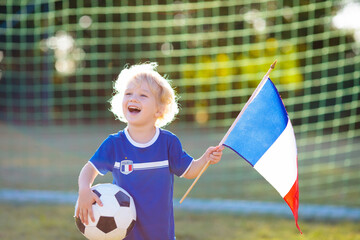 France football fan kids. Children play soccer. - 780394976