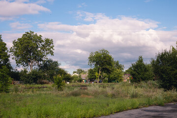 A freight train with wagons is moving along the rails