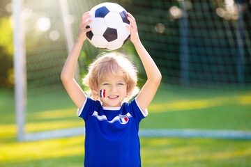 France football fan kids. Children play soccer. - 780395719
